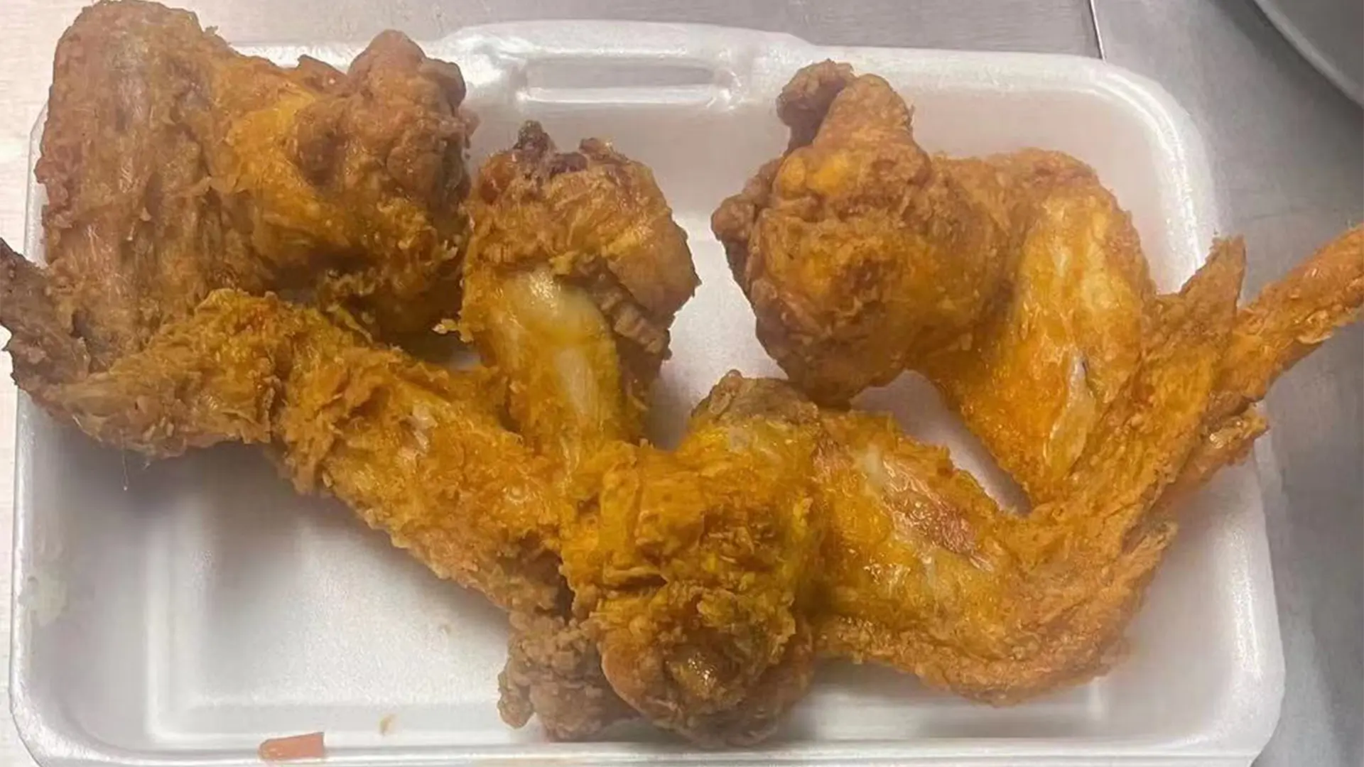 Crispy fried chicken pieces in foam container at New Panda Restaurant, a Chinese Restaurant in Garner