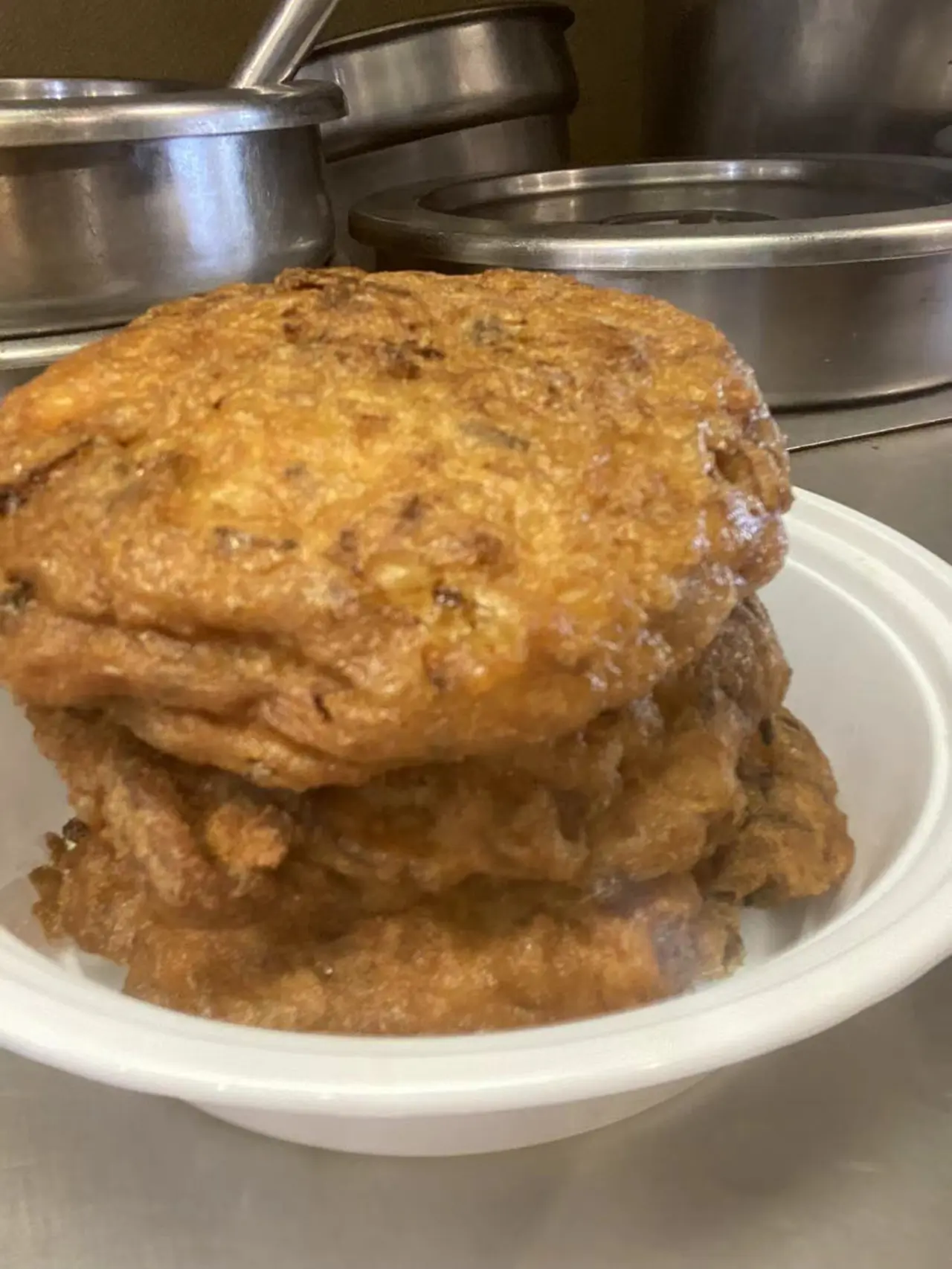 Crispy fried vegetable patties stacked in a bowl at New Panda Restaurant, a Chinese Restaurant in Garner