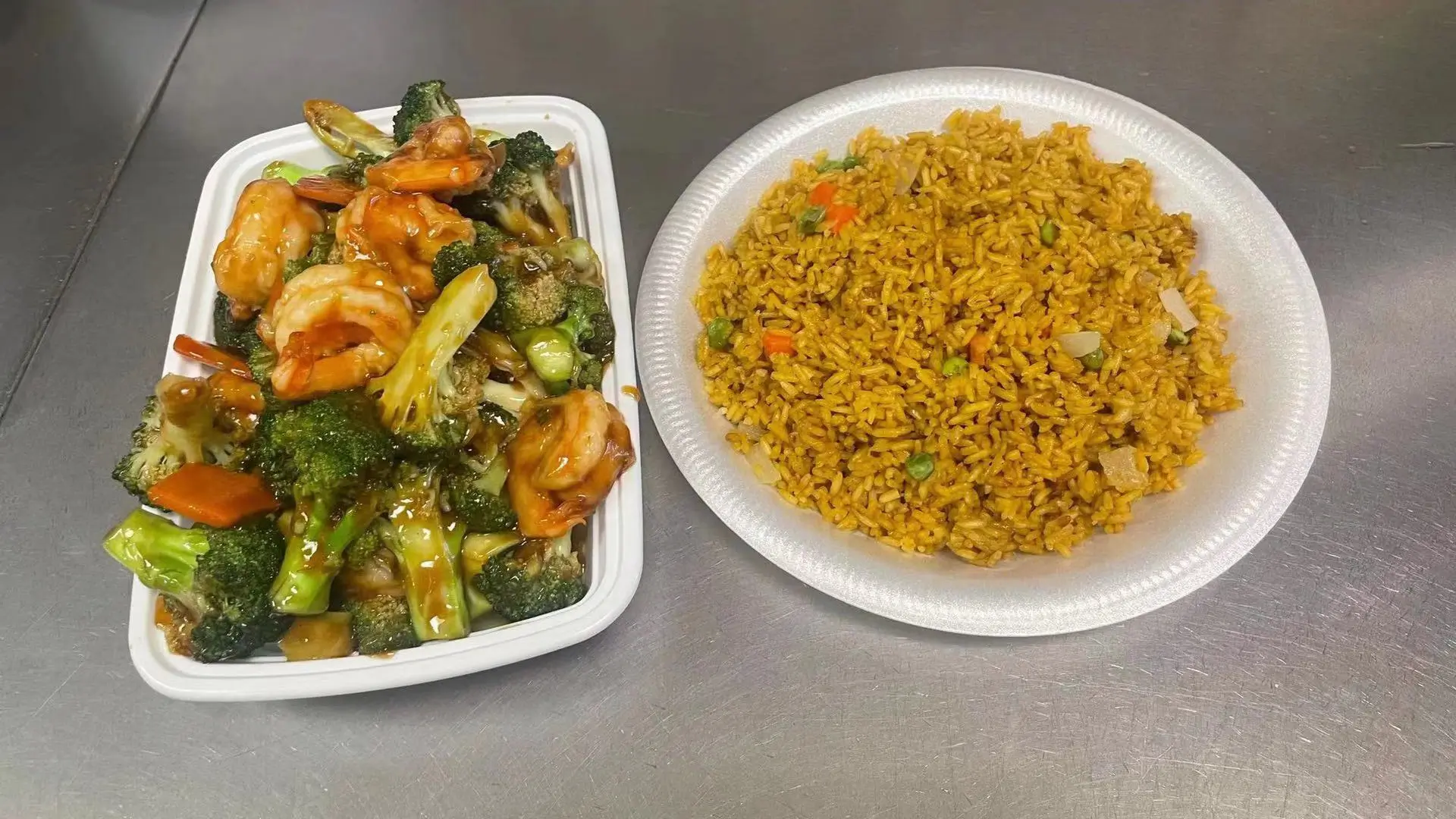 Shrimp with broccoli and a side of vegetable fried rice at New Panda Restaurant, a Chinese Restaurant in Garner